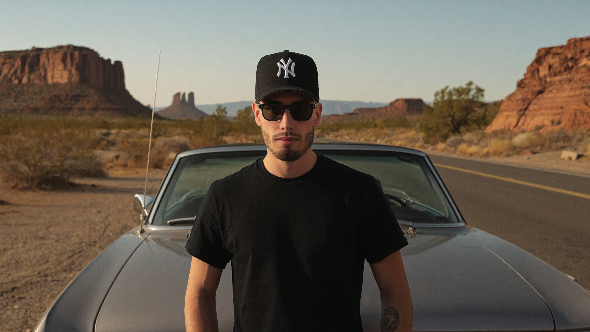 AI generated image of Cody Wise leaning against a convertible on a desert highway at golden hour, a scene built entirely from a text prompt