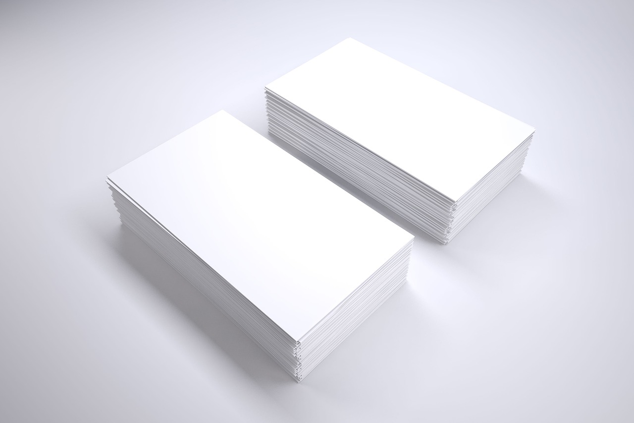 A stack of blank business cards, the stationery layer most brand identity packages price separately.